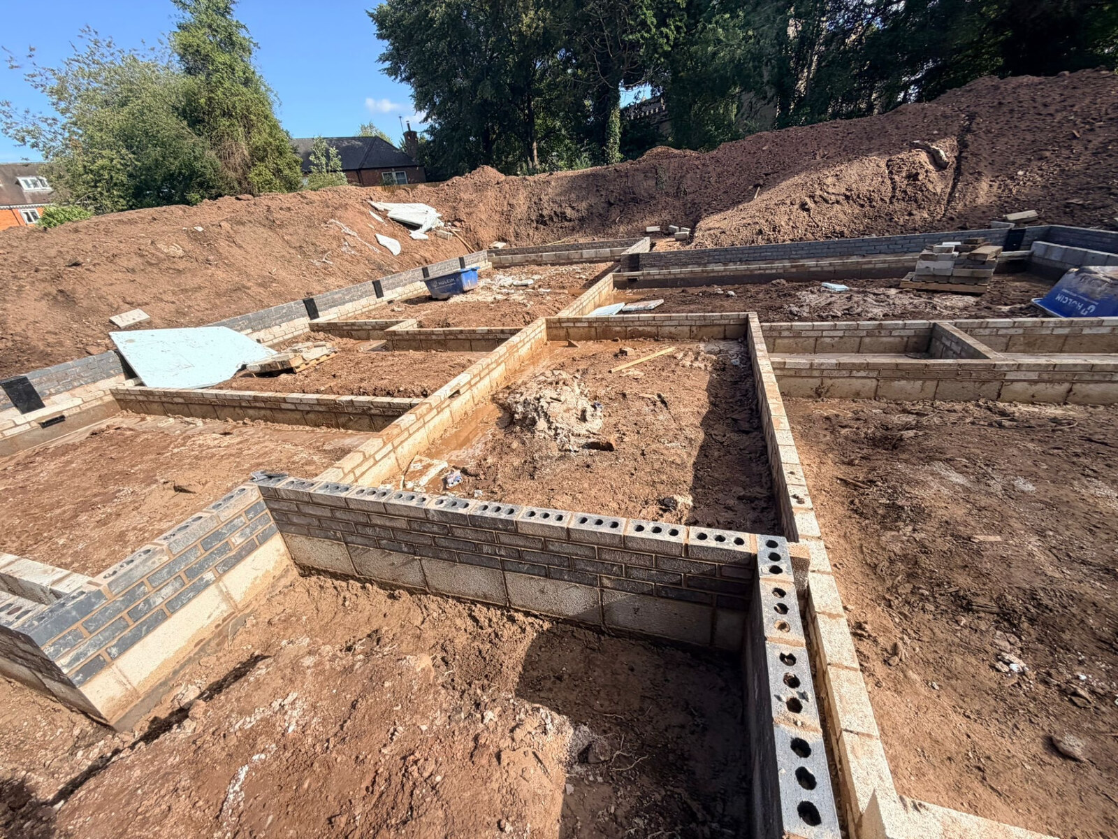 New build substructure brickwork and blockwork foundations with blue brick courses