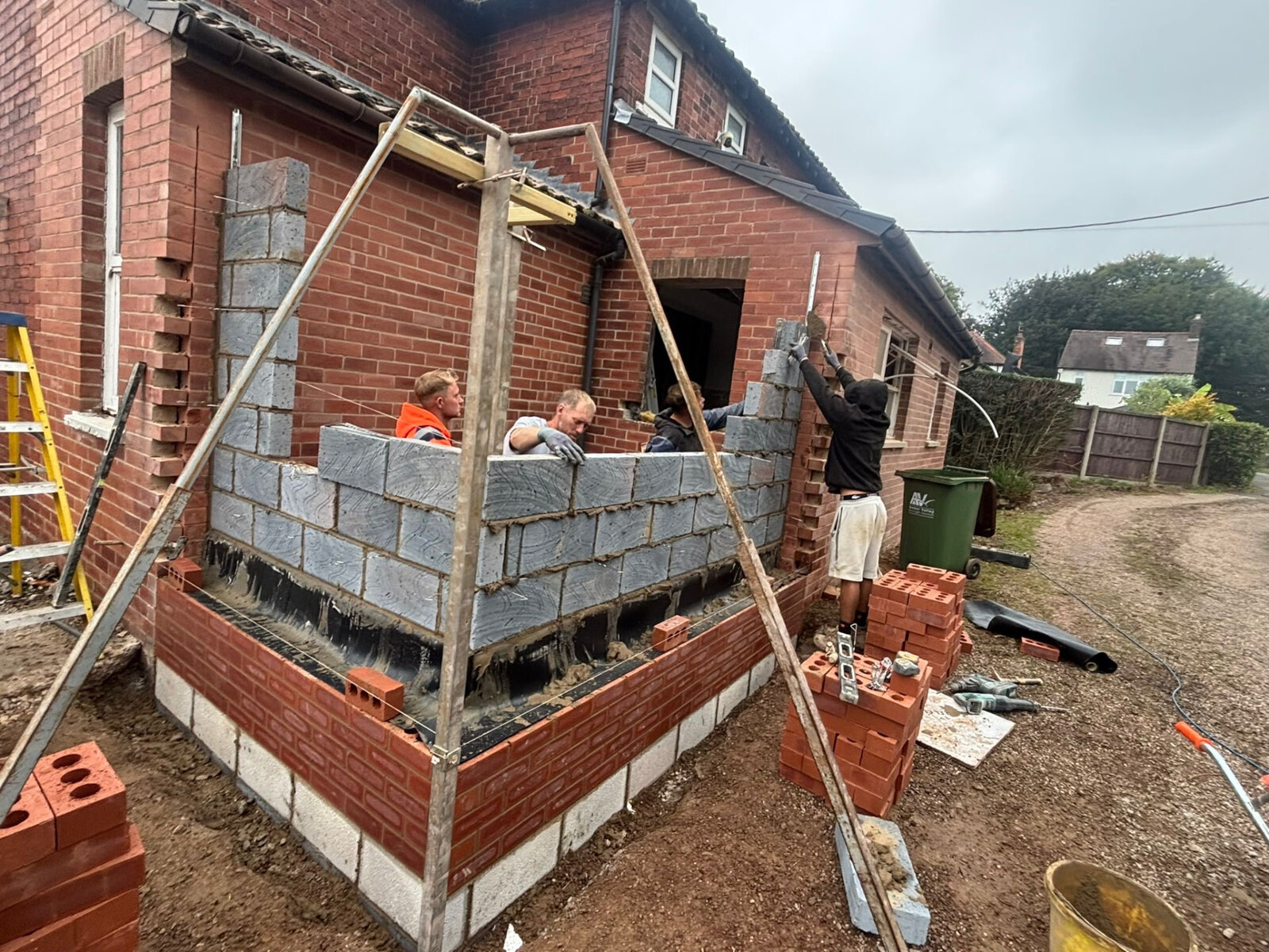 Derby Brickwork team building cavity walls for a rear extension in matching red brick