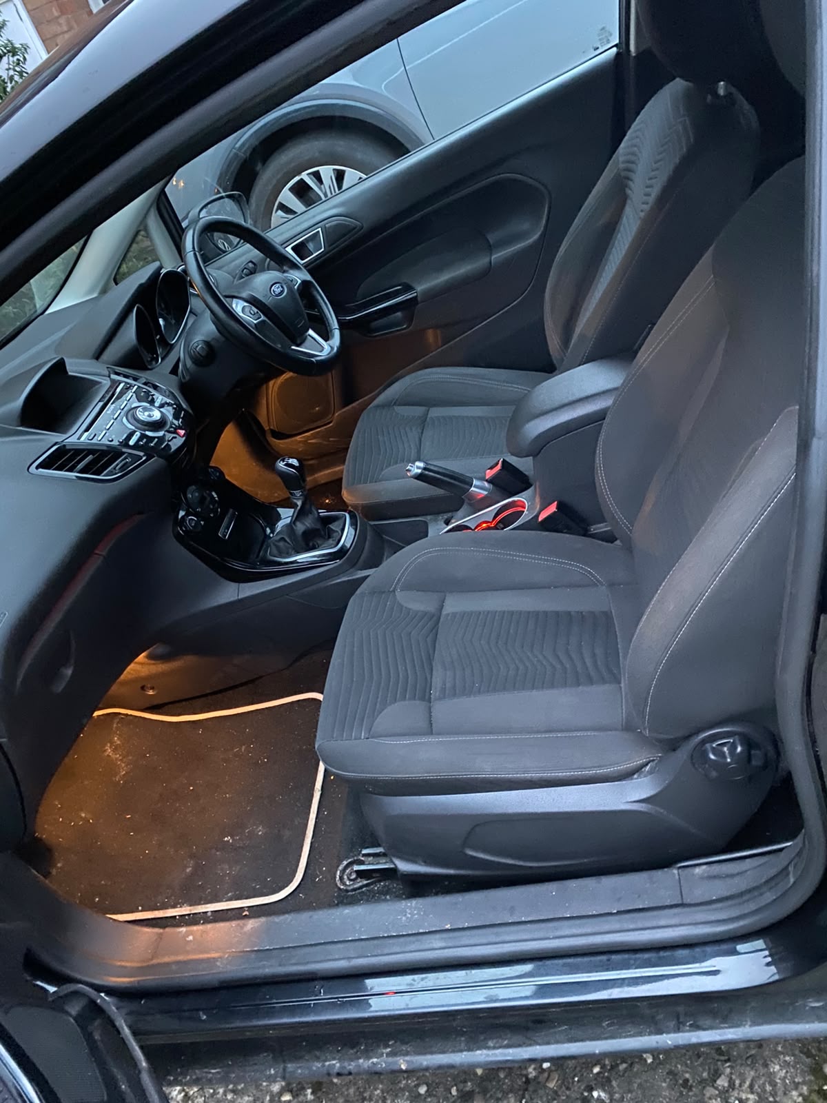 Completed interior valet on a dark cloth interior