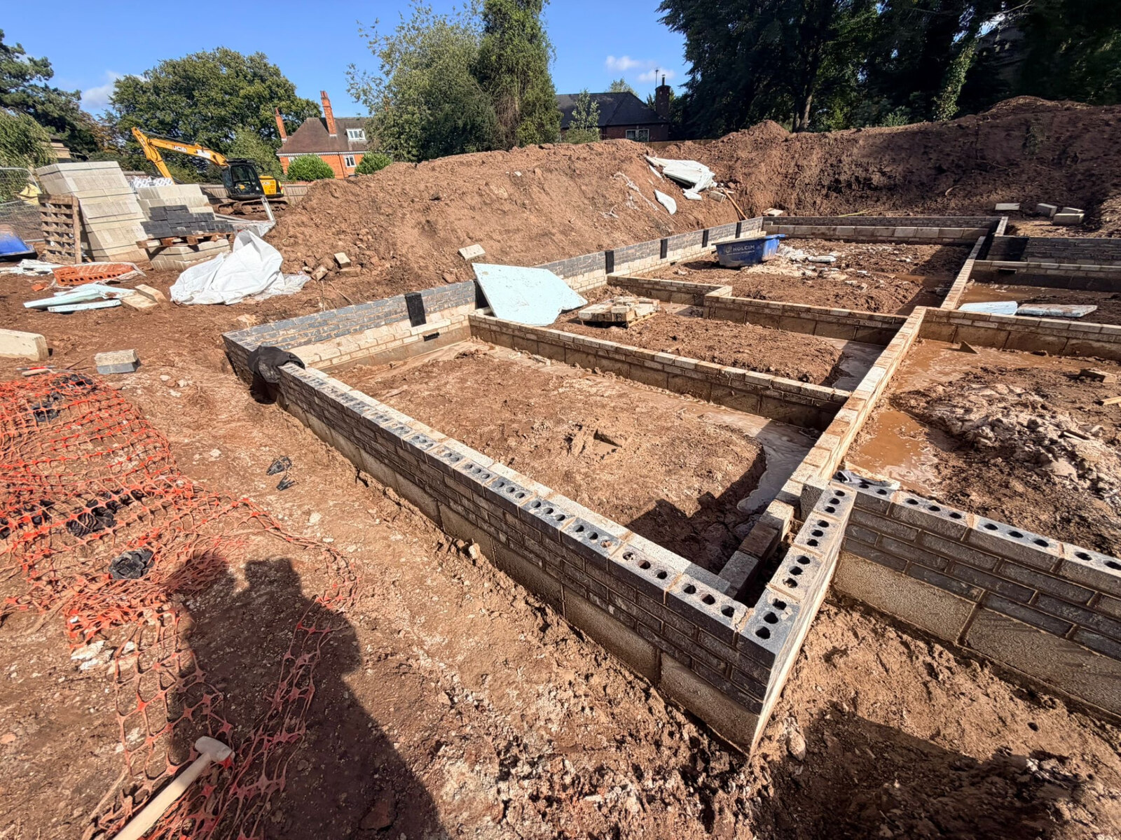 New build foundation walls accurately set out in engineering brick and blockwork