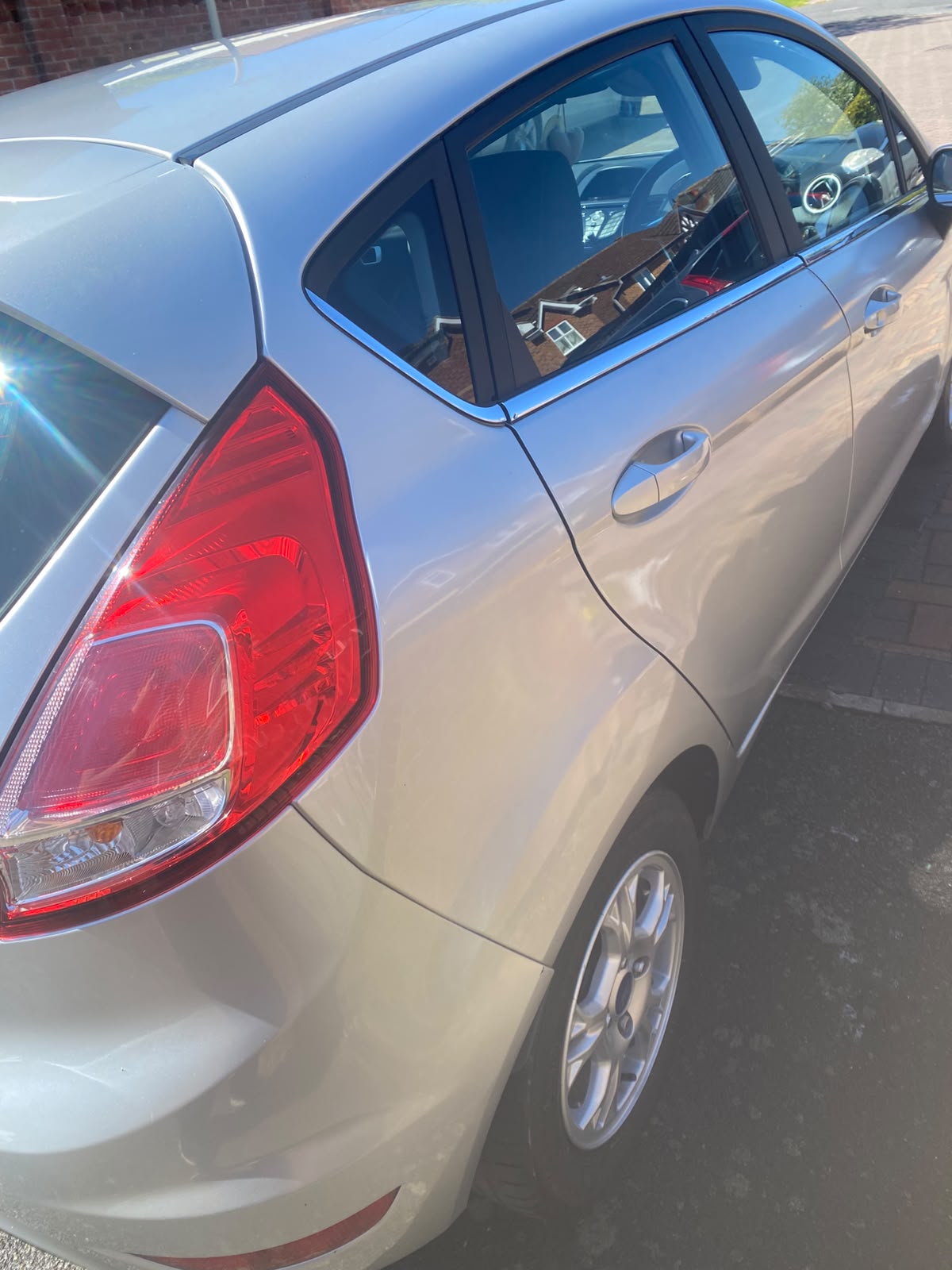 Silver Ford rear quarter with a clean, even shine