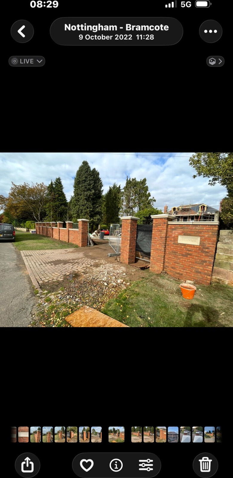 Brick boundary wall with piers, stone coping and gated entrance in Bramcote