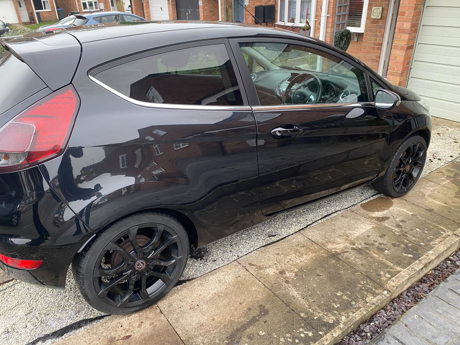Black Ford Fiesta finished to a mirror shine