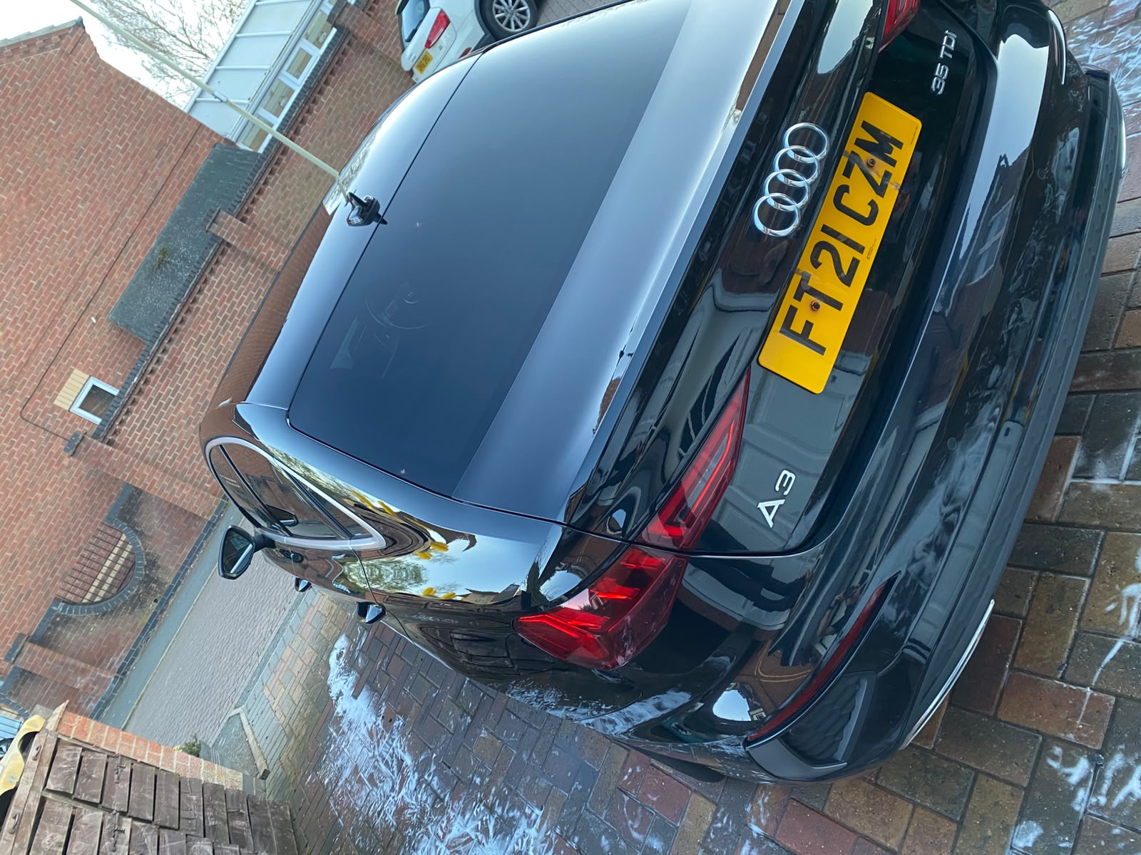 Black Audi A3 rear, freshly washed and dried